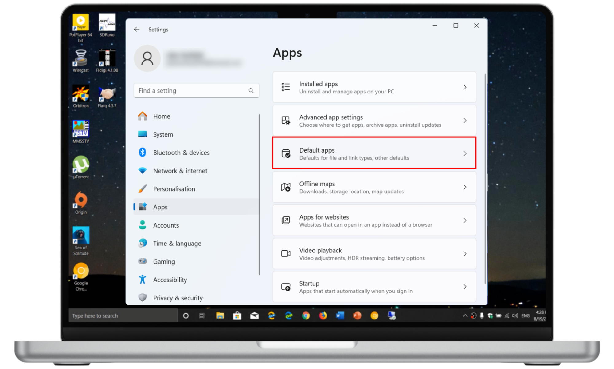 A screenshot from a Windows 11 PC showing how to access the Default apps menu to change your default browser. A screenshot from a Windows 11 PC showing how to access the Default apps menu to change your default browser.